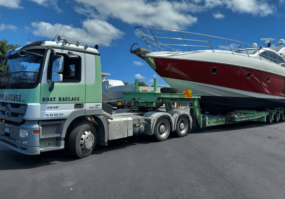 boat haulage moving a large boat with pilot ute vehicle NZ